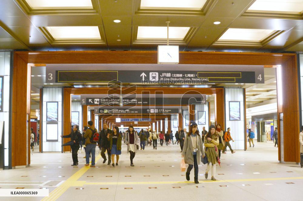 Wood-adorned JR Kanazawa Station's concourse