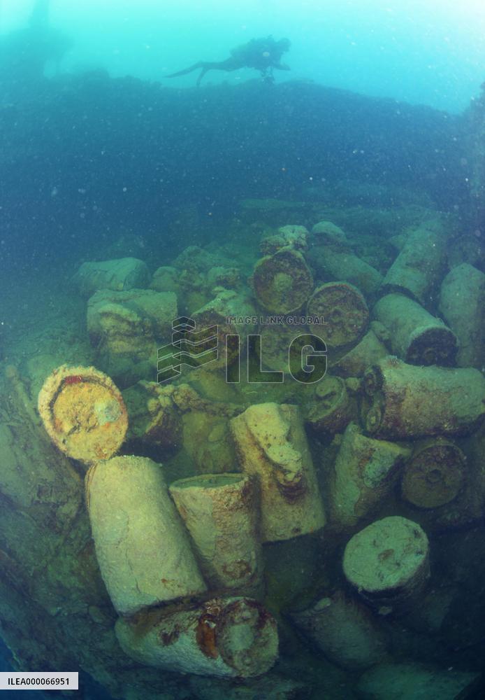 Bombs litter belly of sunken Japanese WWII ship off Palau island
