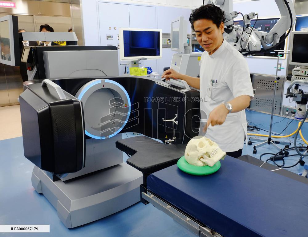 Kyoto Univ. Hospital official operates mobile CT system