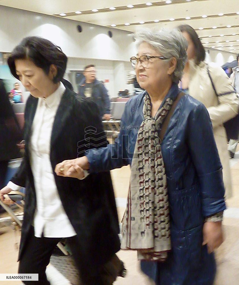 Deported U.S. aid worker arrives in Beijing from Pyongyang