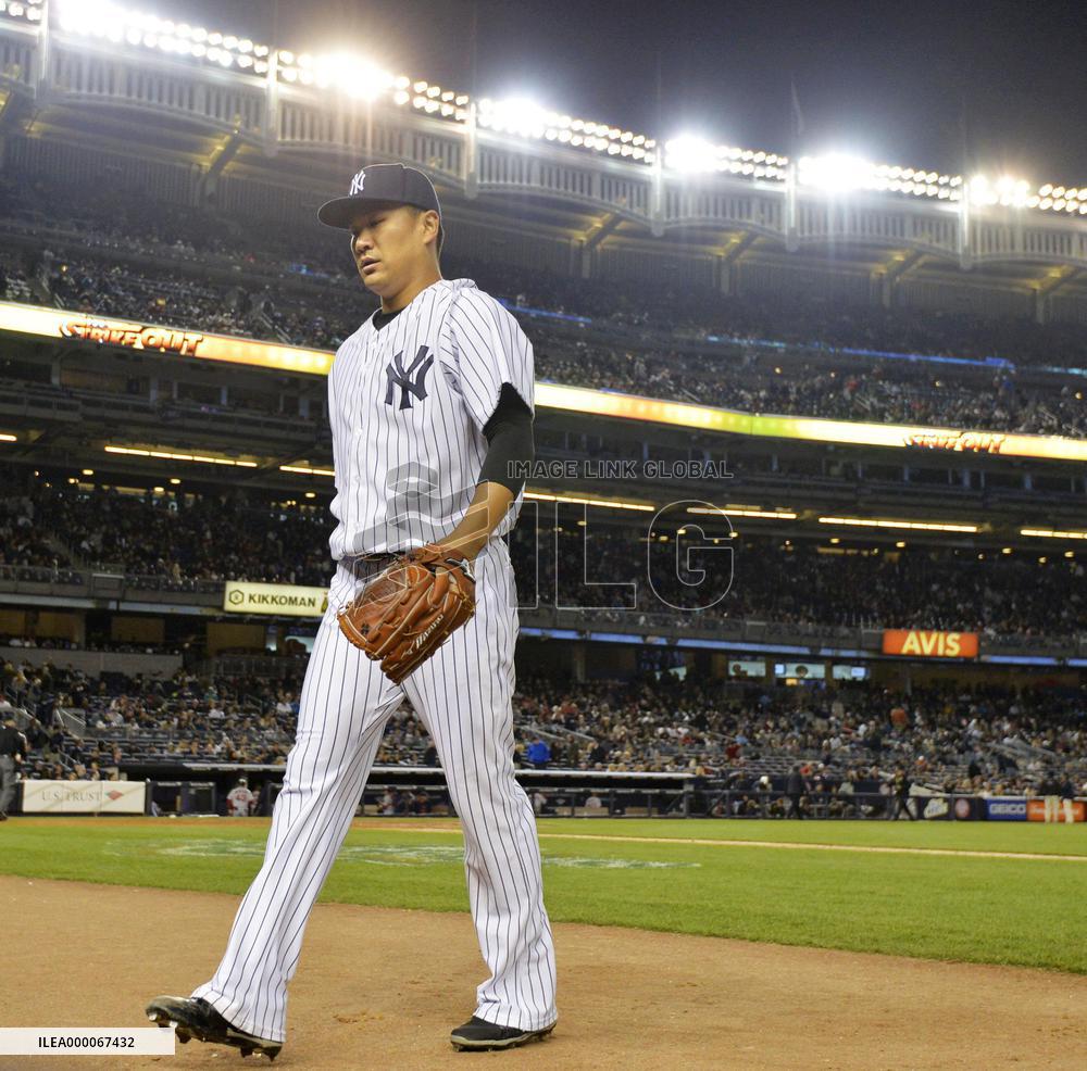 Yankees' Tanaka gets season's 1st win