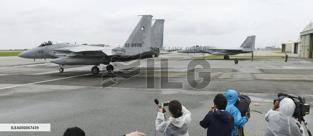 F-15 fighter jets launch for scramble