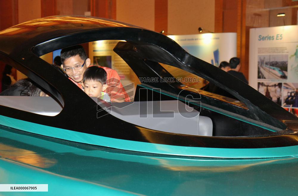 Singaporeans try out bullet train operation in simulator
