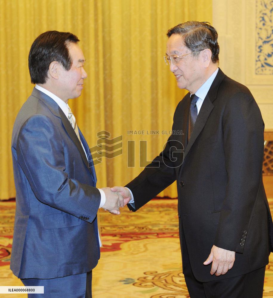 Japanese ruling party lawmaker meets China's top political adviser