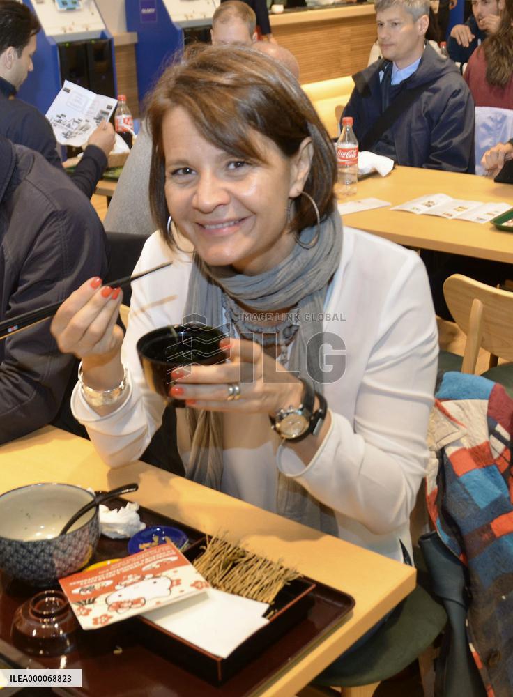 Woman tastes "miso" soup at Japanese pavilion in Expo Milano 2015