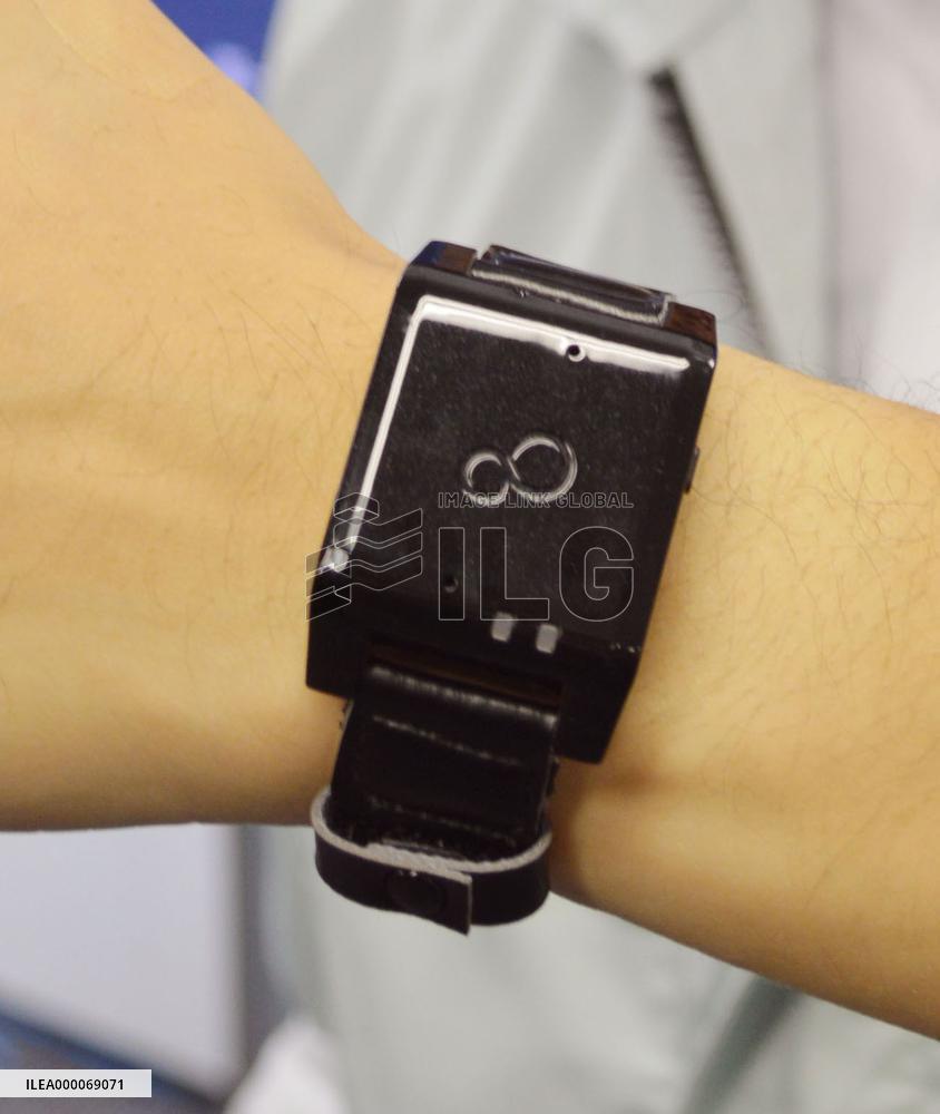 Fujitsu's vital-sign sensing band shown in Tokyo