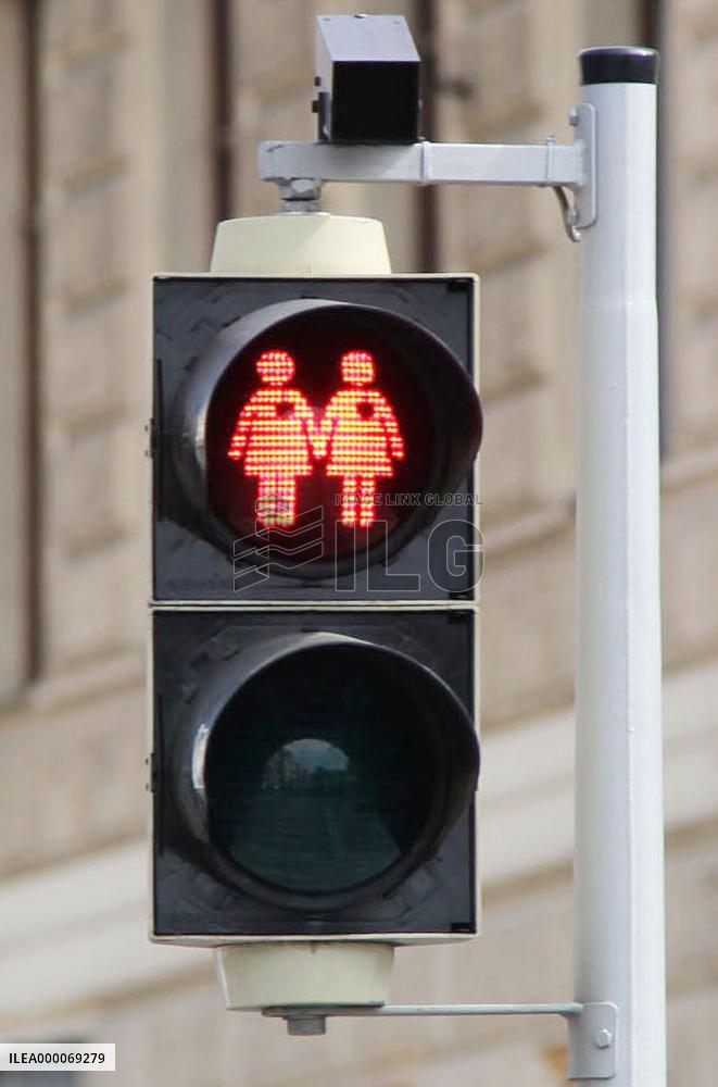 Pedestrian light featuring lesbian couple