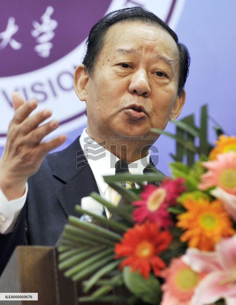 Japan lawmaker with letter from Abe says "possible" to meet Xi