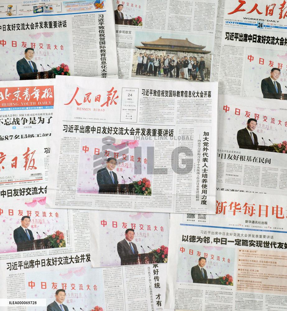 Chinese newspapers report on Xi's attendance at China-Japan event