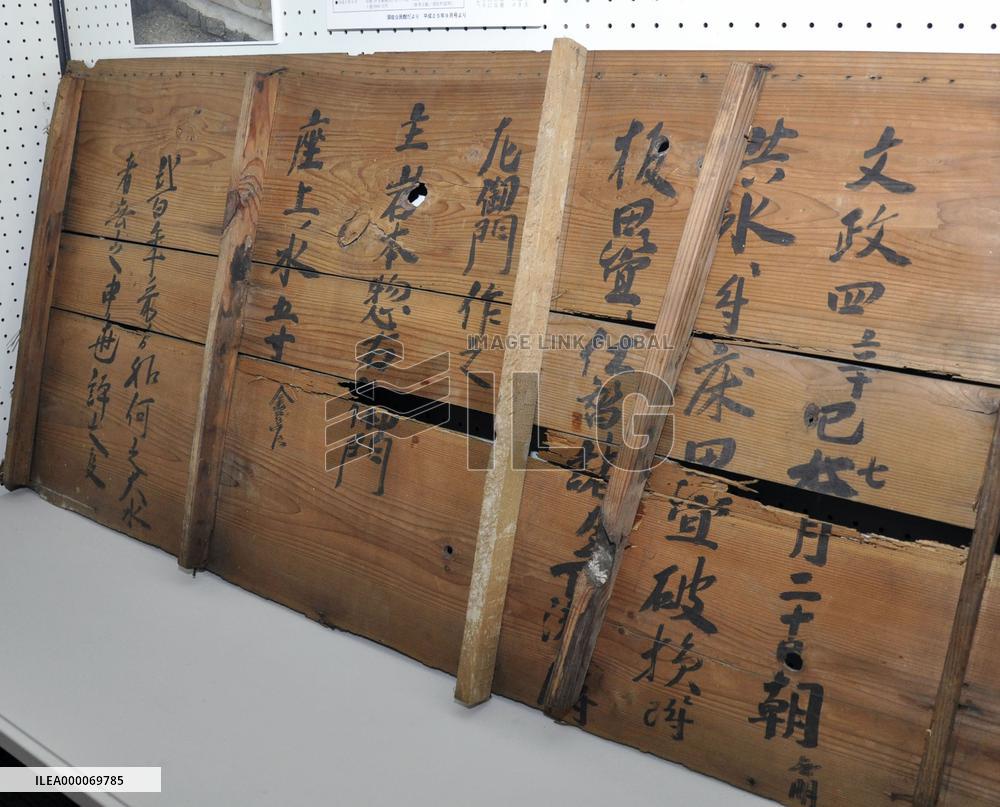 Susa museum displays board showing record of 1821 flood damage