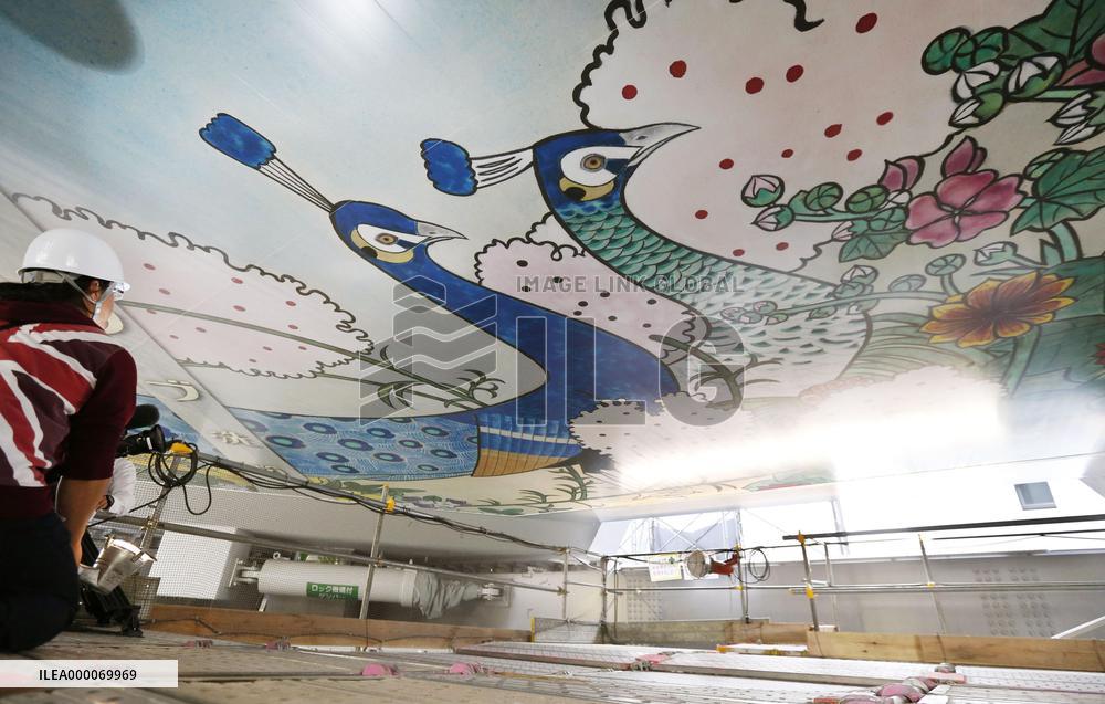 Osaka landmark tower's re-created ceiling mural unveiled to press