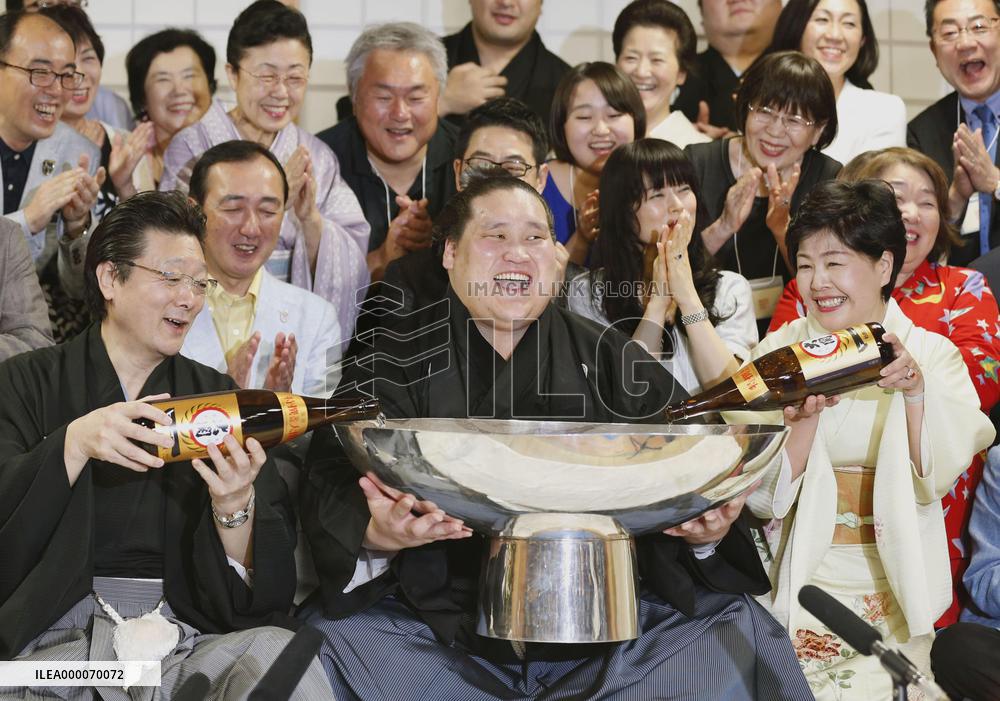 Terunofuji beams after winning summer sumo title