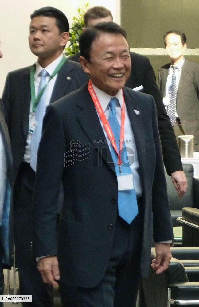 Aso enters venue for G-7 finance chiefs' meeting in Dresden