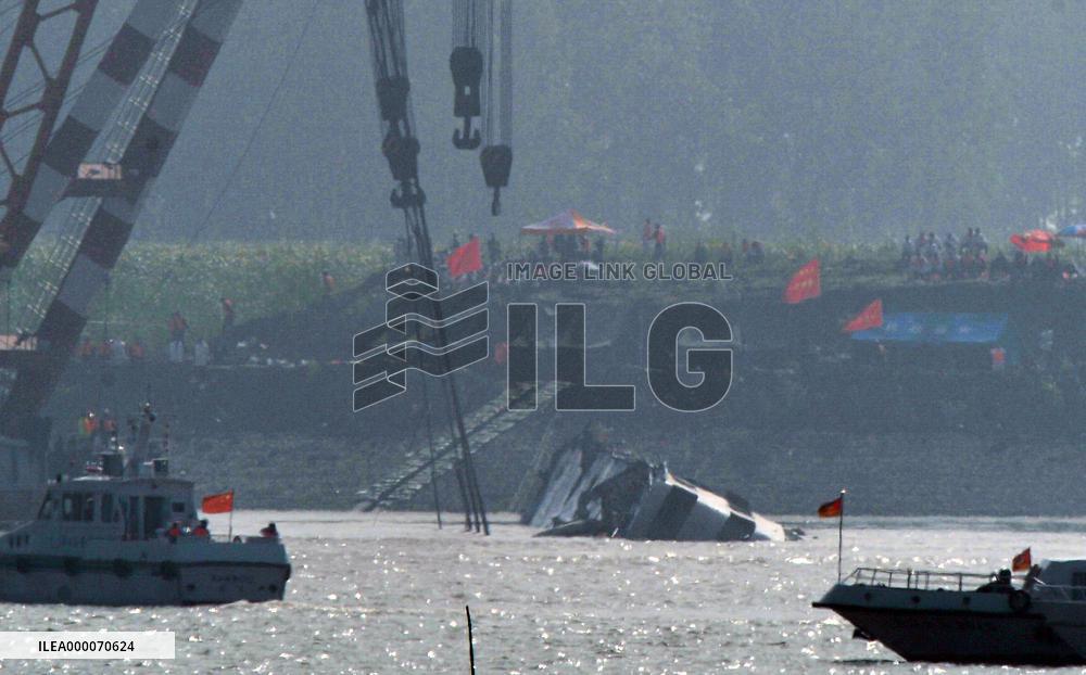 Capsized ship righted as search for bodies continues in China