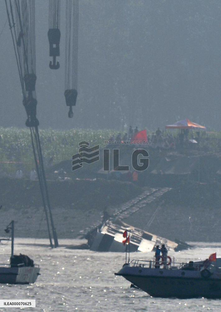 Capsized ship righted as search for bodies continues in China