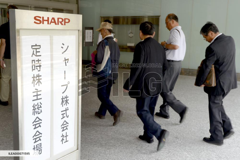 Sharp apologizes for massive losses at shareholders' meet
