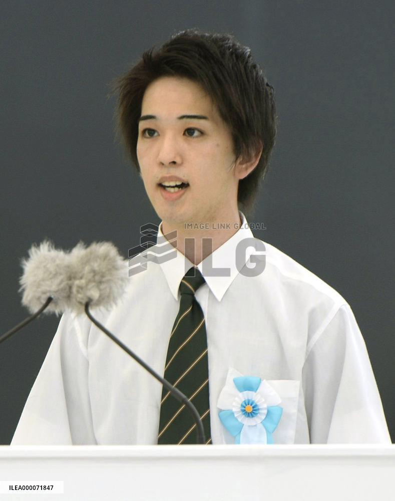 High school boy reads poem of peace at Battle of Okinawa ceremony