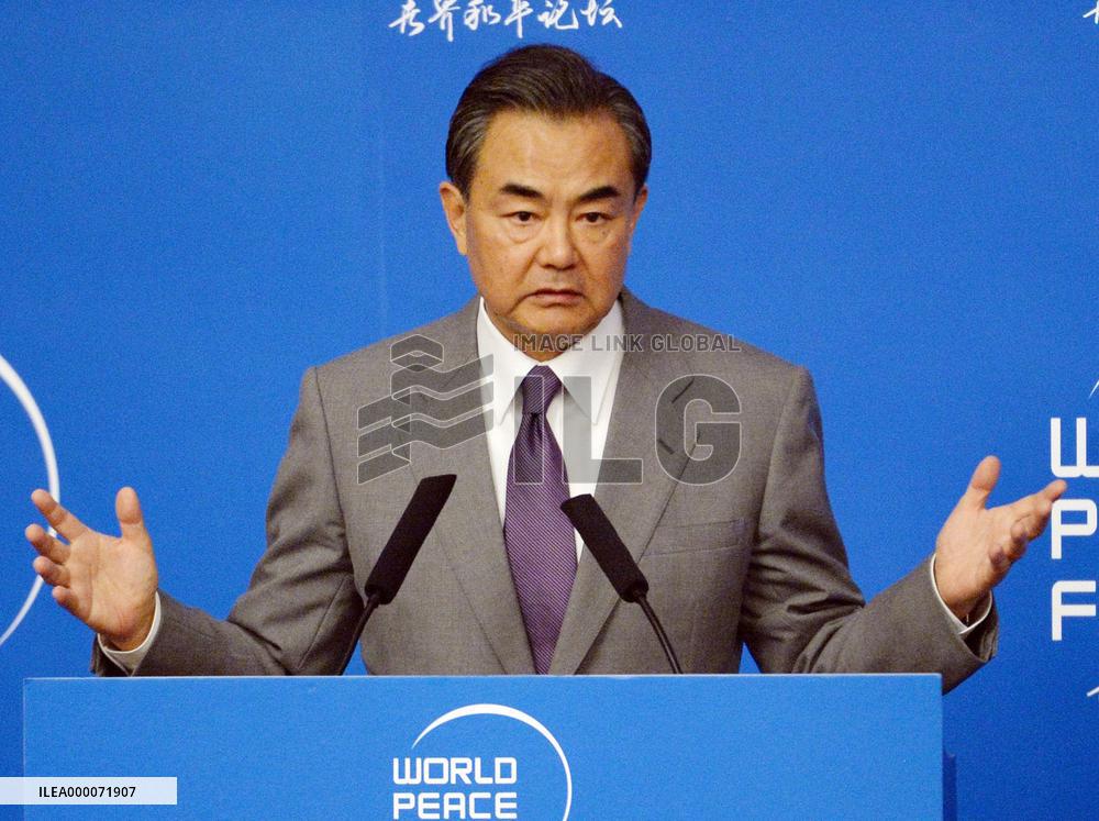 China urges Japan to accept its growing power for better ties