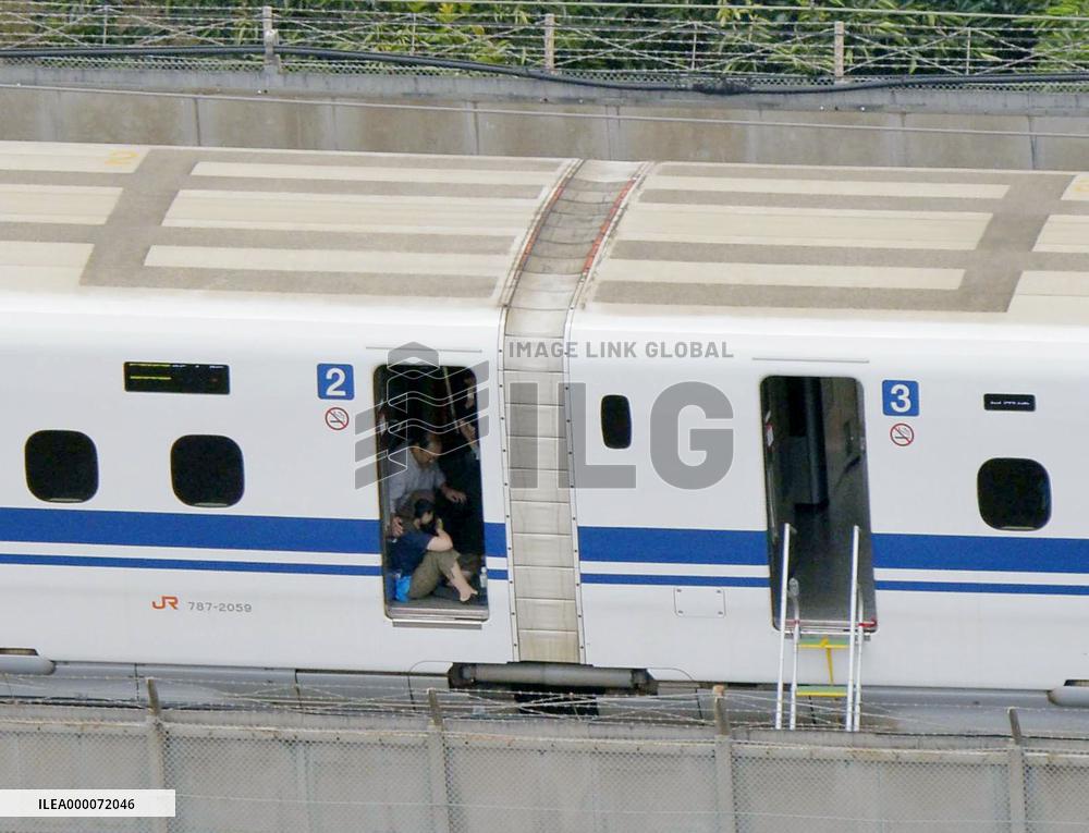 Shinkansen bullet train makes emergency stop due to smoke