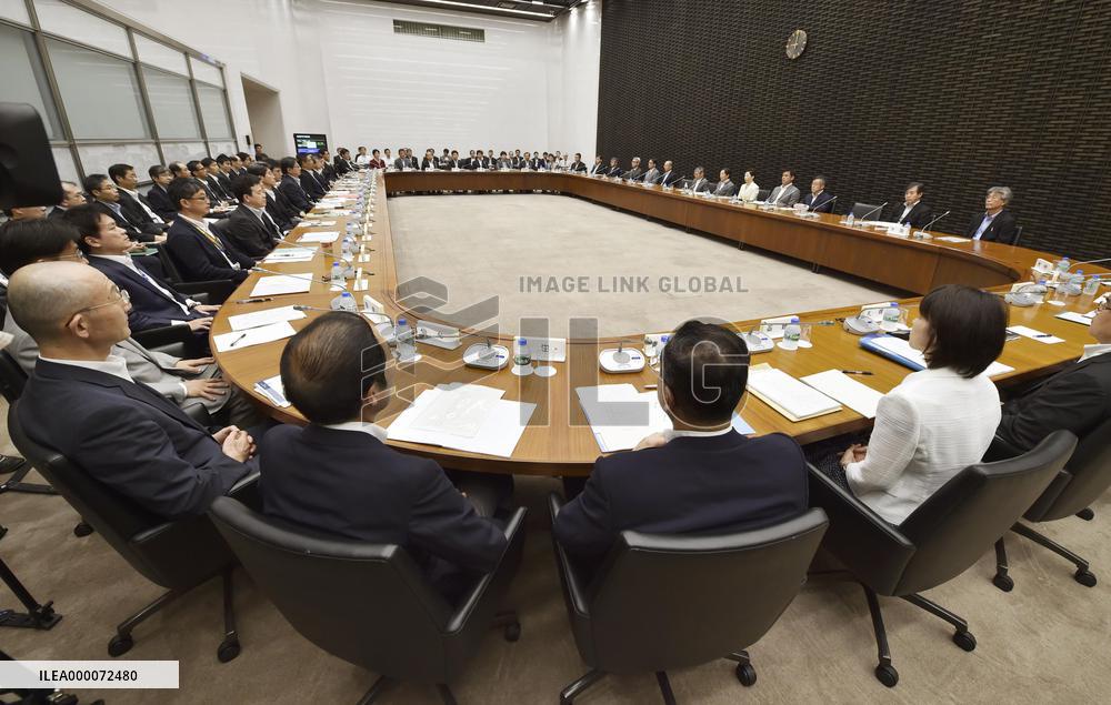 BOJ chief says Japan economy recovering moderately