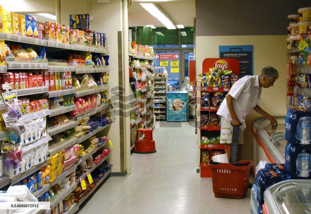 Few shoppers seen at supermarket in Athens