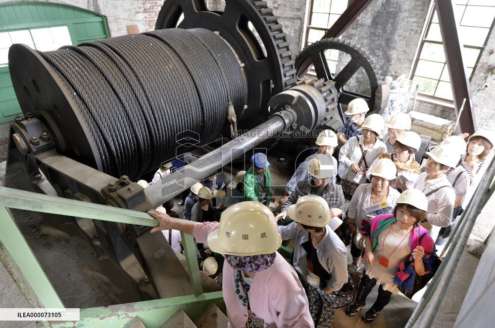 Visitors see winch of coal pit, new World Heritage site