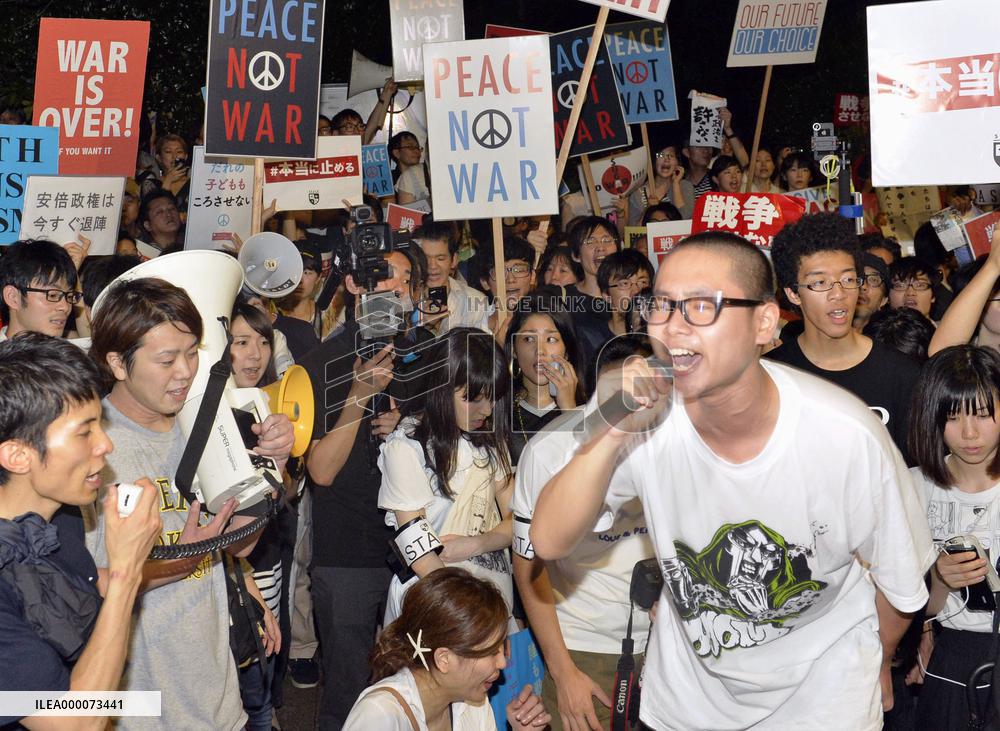 Japan lower house OKs security bills amid opposition boycott