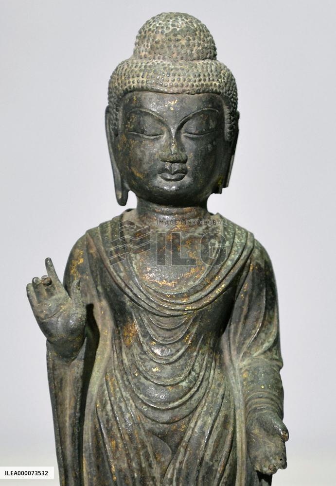 Stolen Buddhist statue arrives from South Korea