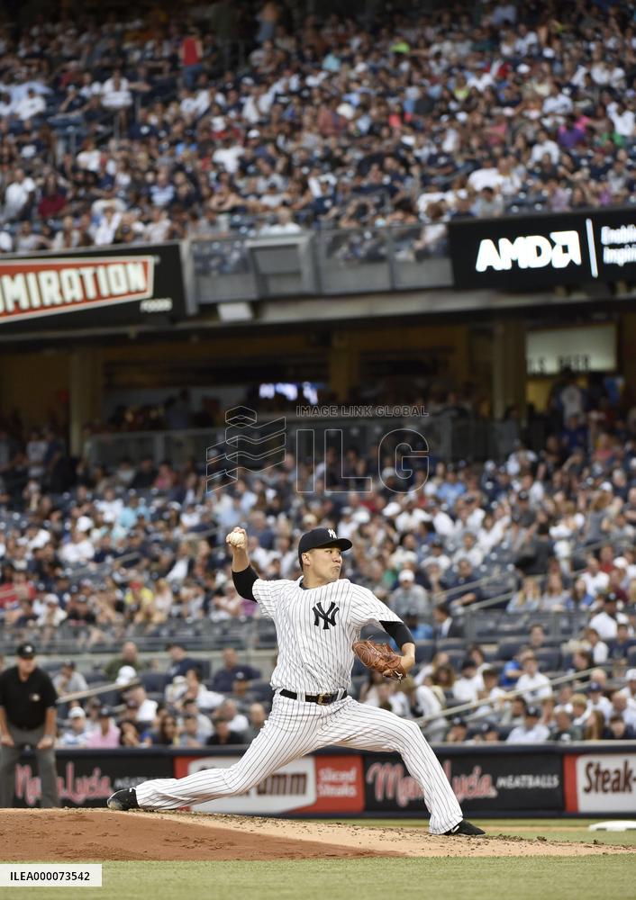 Tanaka wins 6th game with 7 solid innings