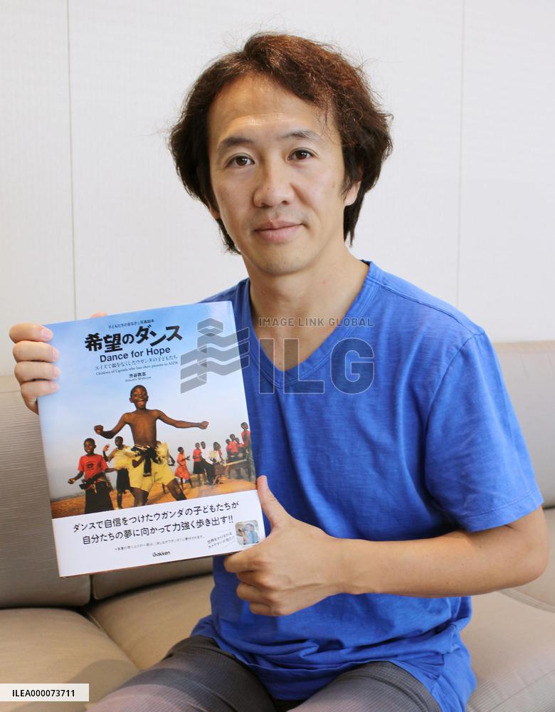 Japanese photojournalist releases book on Ugandan AIDS orphans