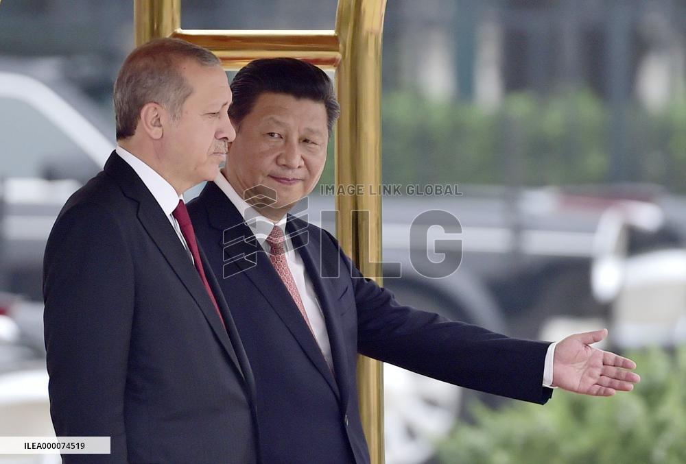 Chinese President Xi greets visiting Turkish President Erdogan