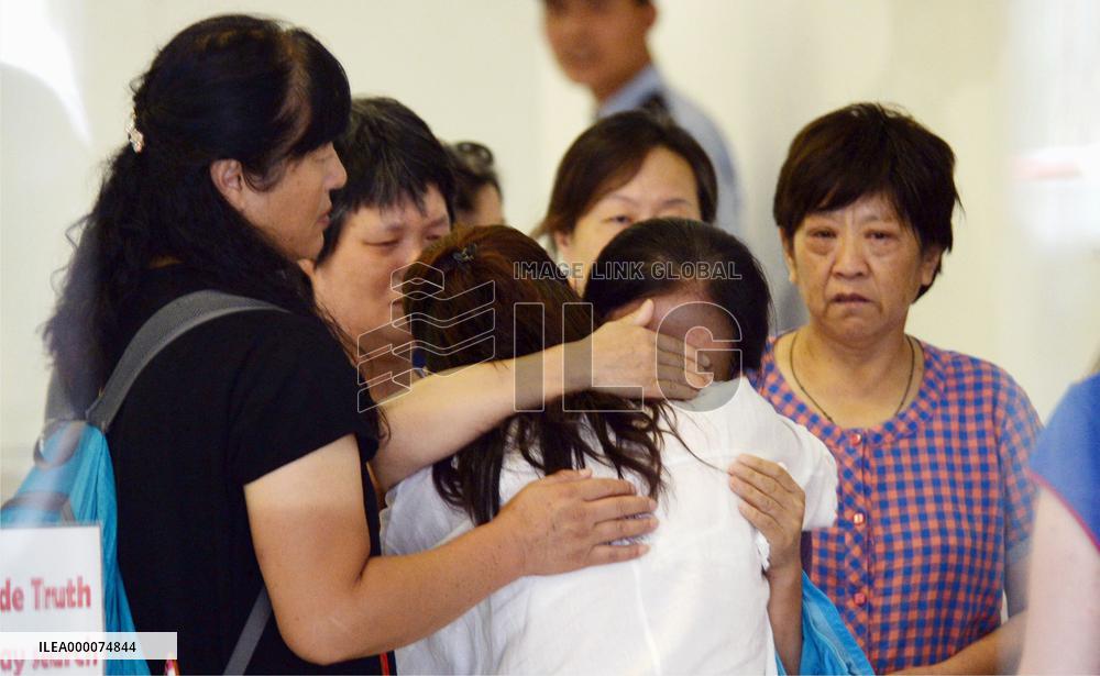 Malaysian Airlines MH370 relatives protest in Beijing