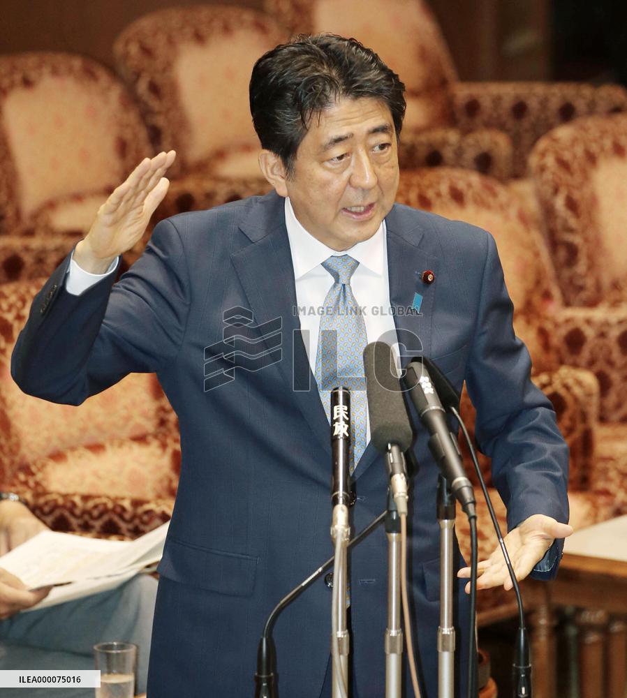Abe admits difficulties changing Constitution through formal process