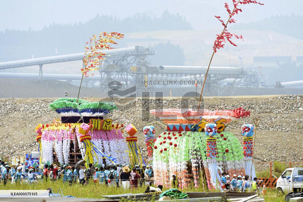 Floats paraded at festival in tsunami-hit northern Japan town