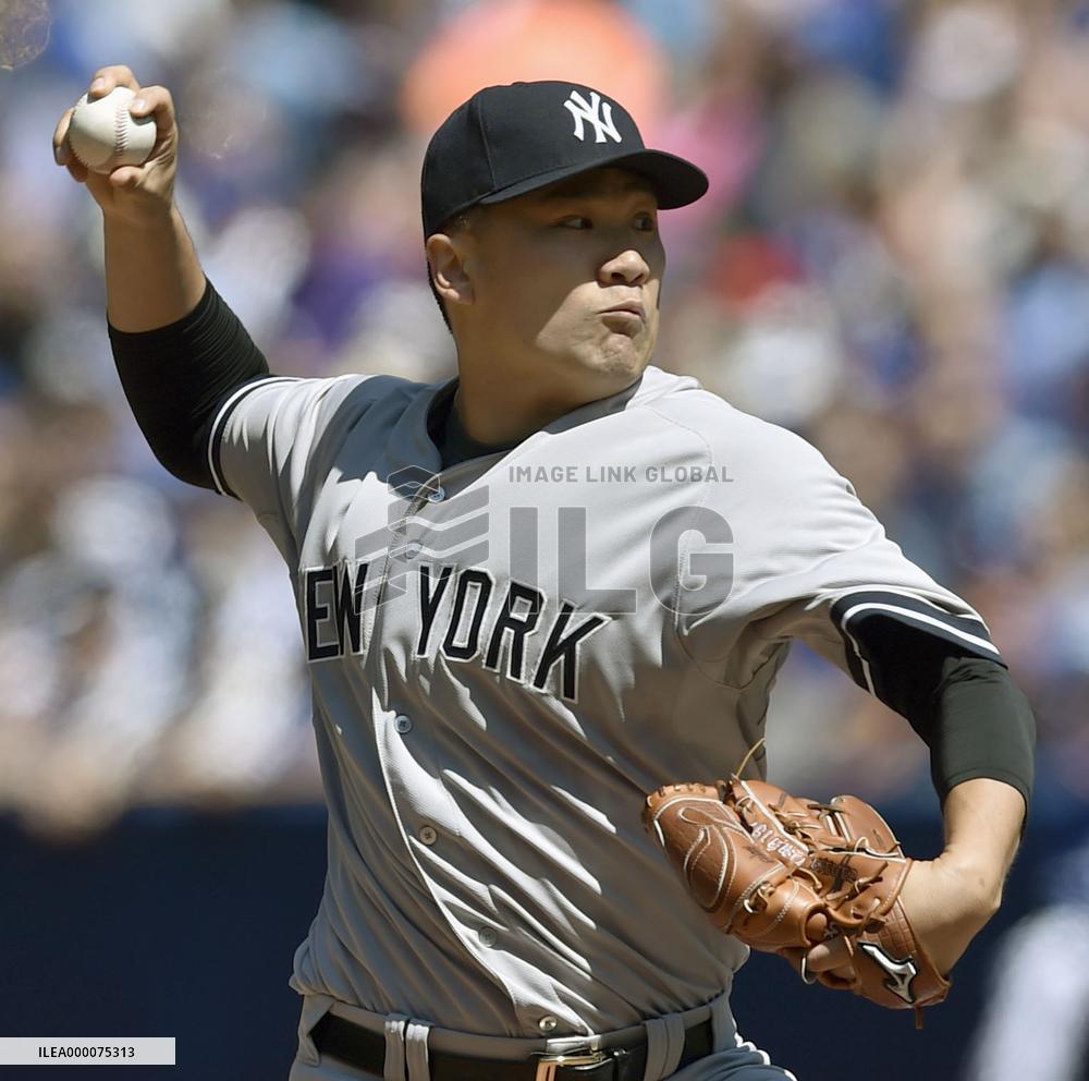 Tanaka goes distance as Yanks increase lead over Jays
