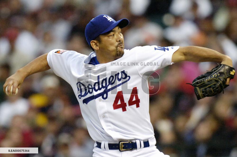 Former major league closer Saito to retire