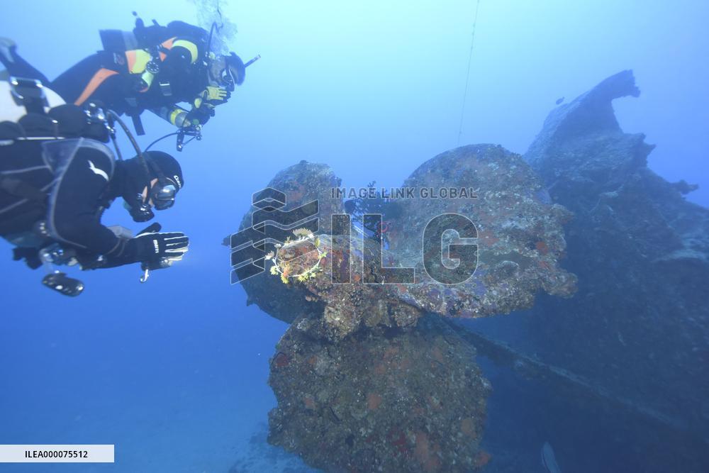 Okinawa divers pray for souls of sunken U.S. warship crew