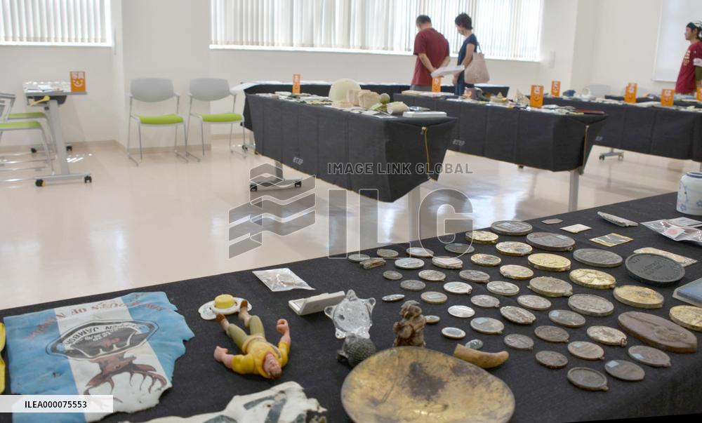 Tsunami-swept items await reunions with owners