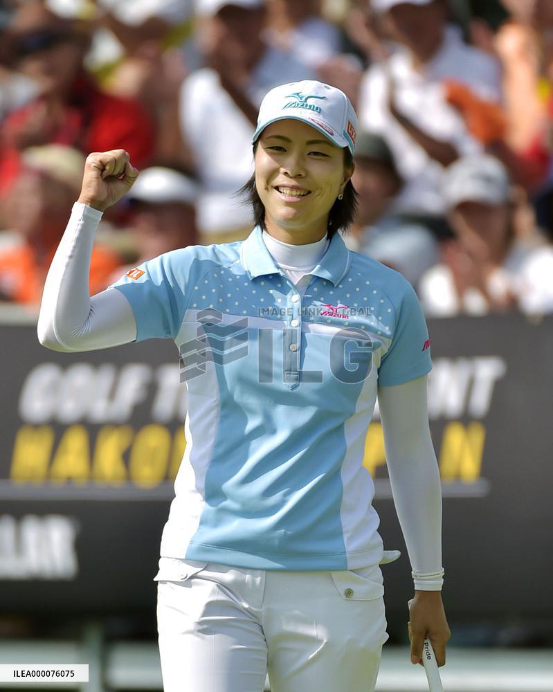 Japan's Hattori reacts after winning CAT Ladies golf tourney