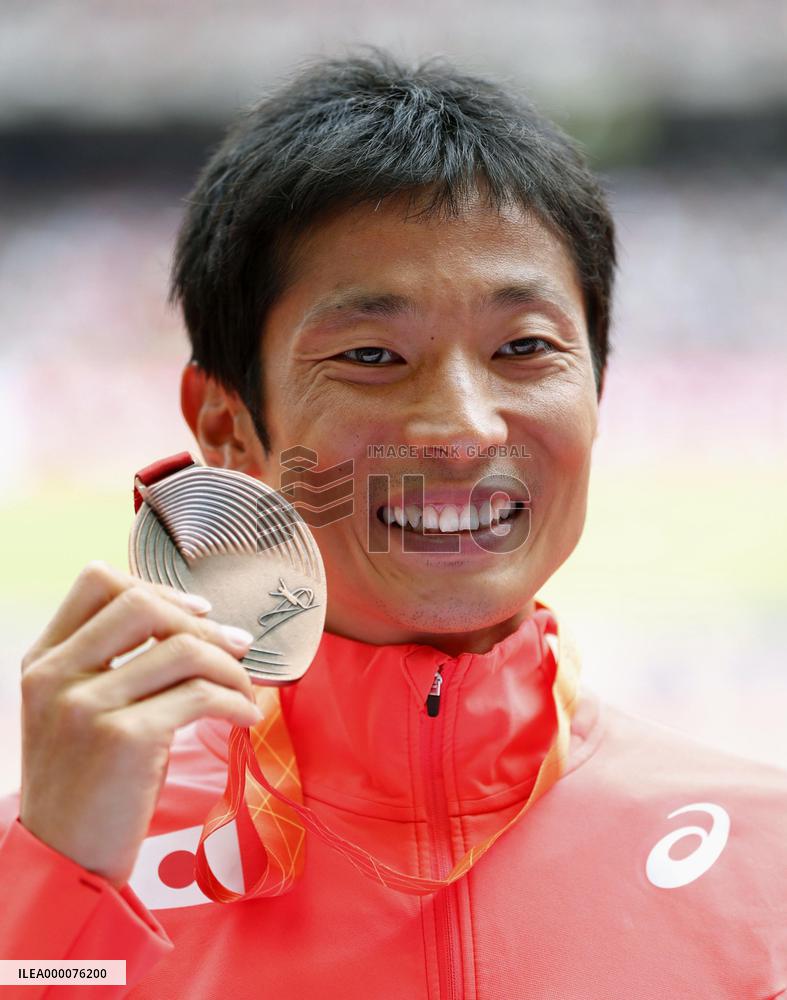 Tanii wins bronze in men's 50-kilometer walk