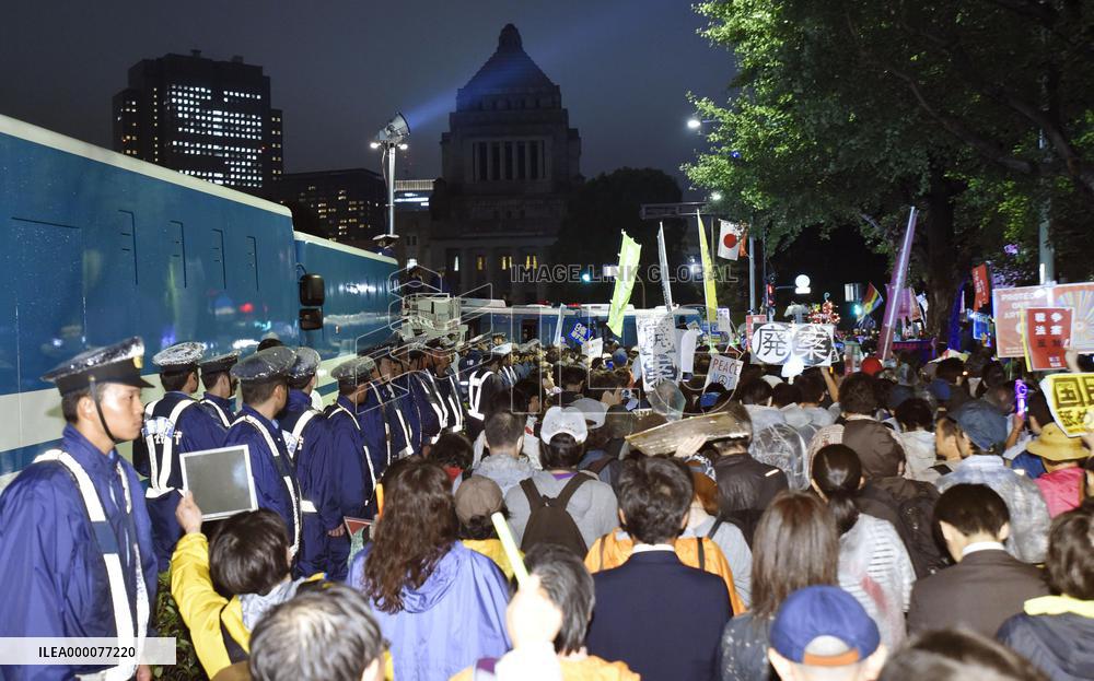 Japan's security bills clear upper house panel