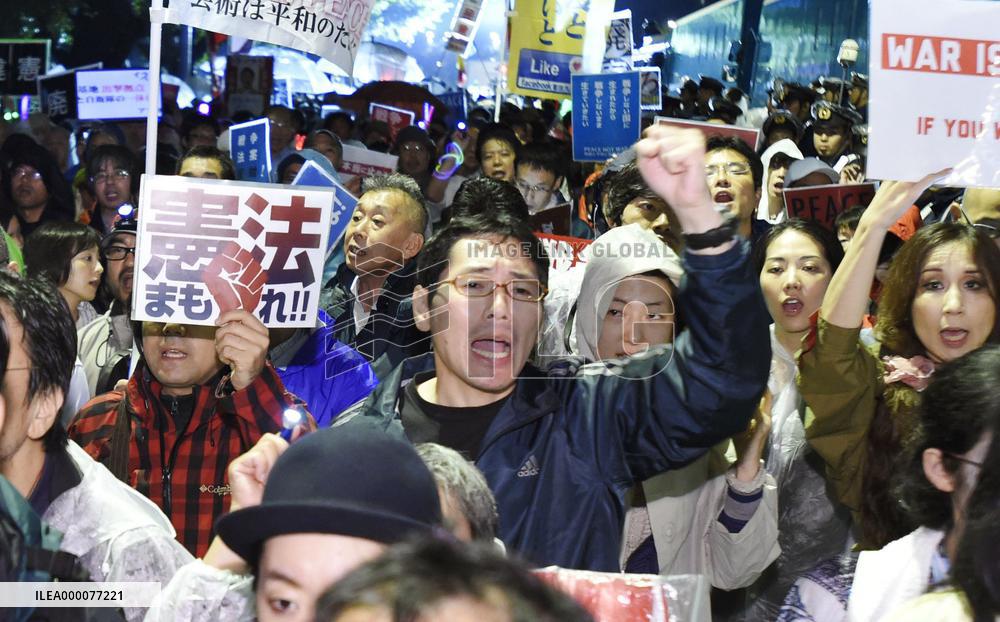 Japan's security bills clear upper house panel