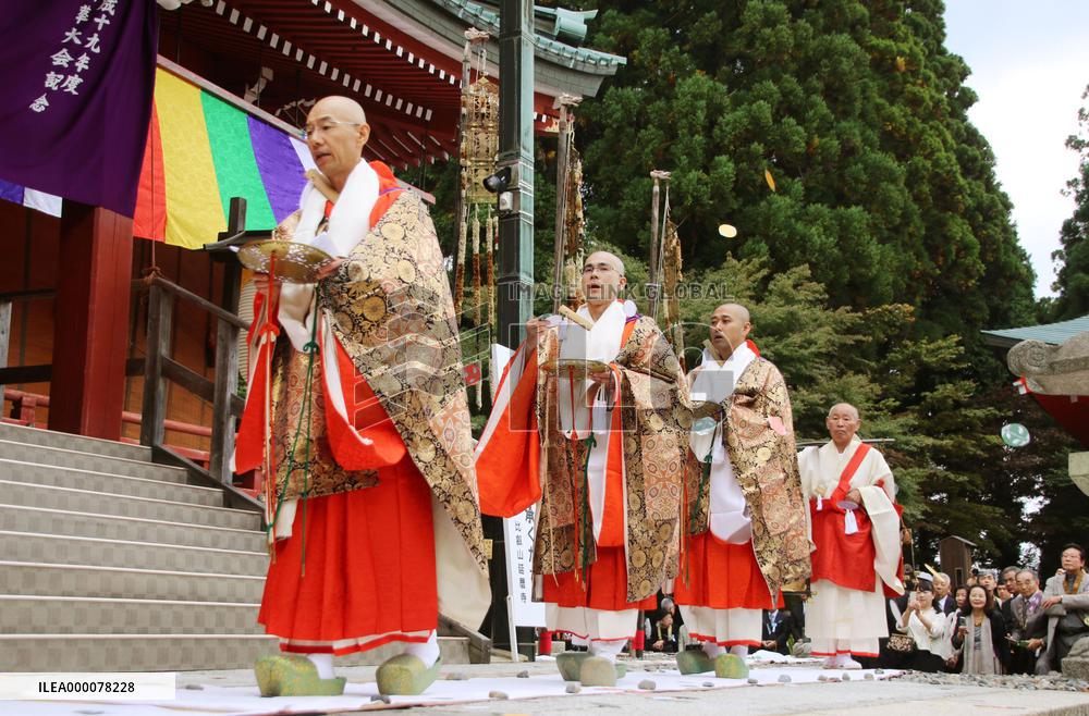 Tendai Buddhism priests walk around auditorium at Enryakuji