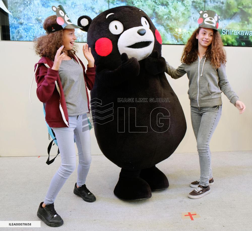 Visitors to Milan expo meet Japan's popular black bear mascot