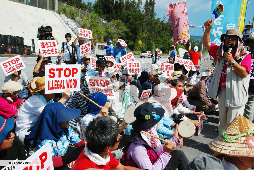 People protest as minister invalidates Okinawa decision