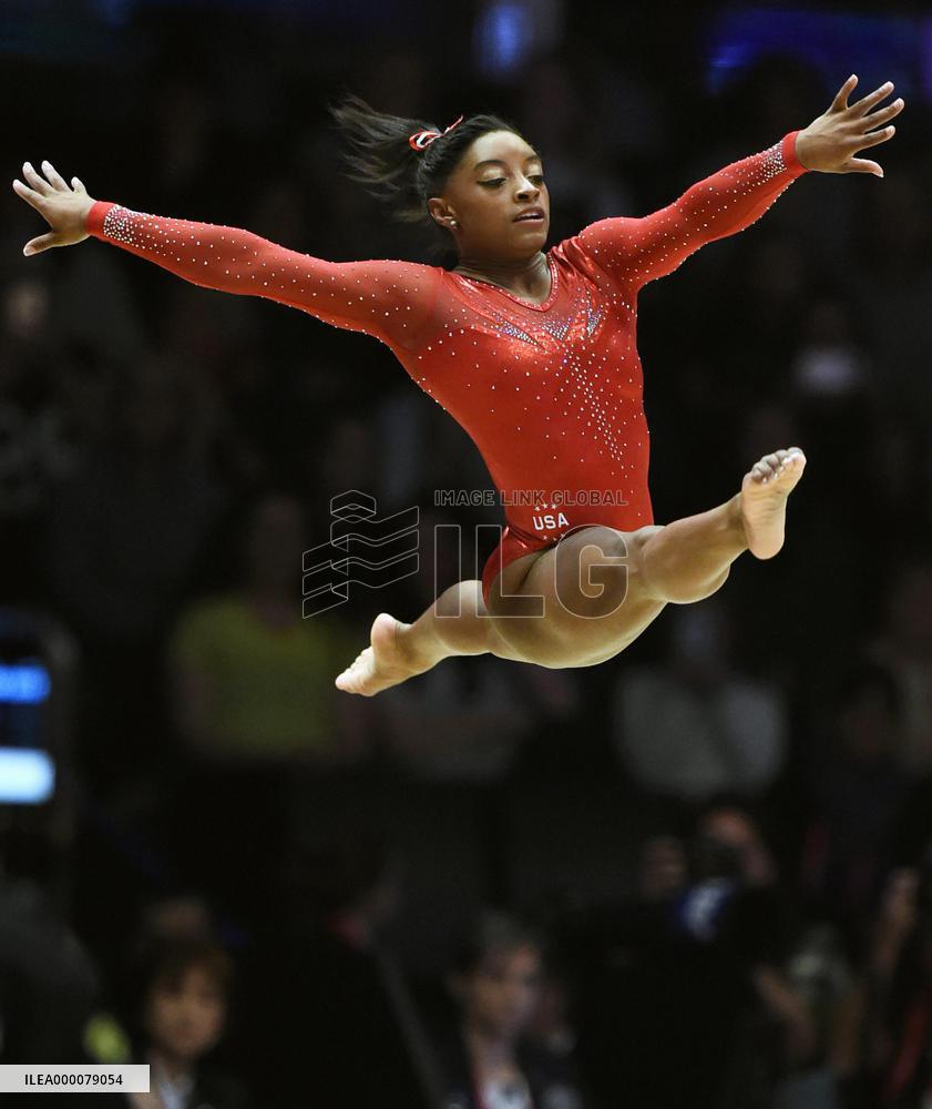 Biles becomes 1st woman to win 3 consecutive world titles
