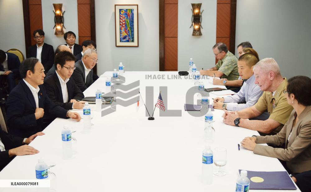 Suga visits Guam for talks with U.S. commander