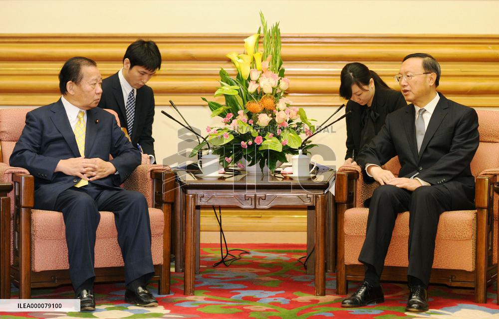 Senior Japan, China officials meet before trilateral summit