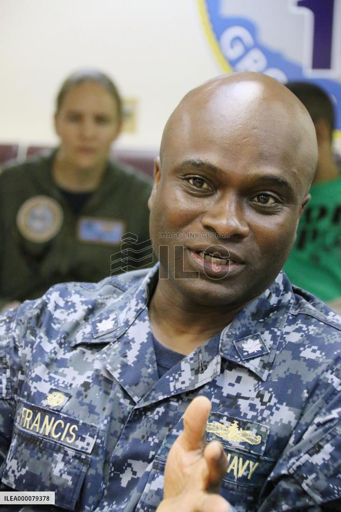 U.S. secretary of defense visits aircraft carrier in South China Sea