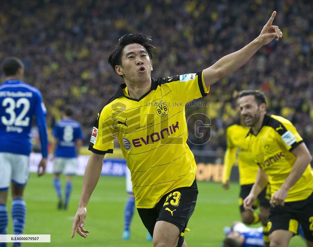 Kagawa on target as Dortmund win derby thriller